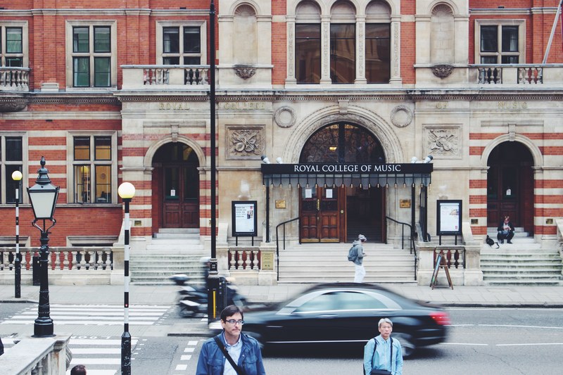 street in front of the facade of the royal college of music in london, royal college of music facade 4k