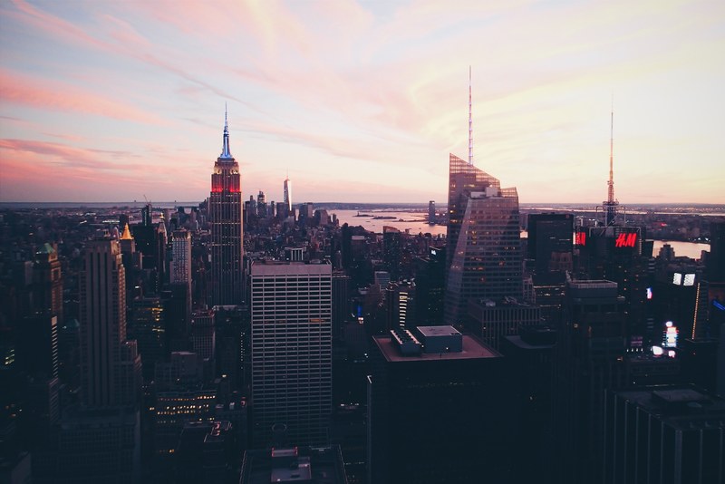 a panoramic view of new york city skyscrapers during sunset, _nyc sunset 4k