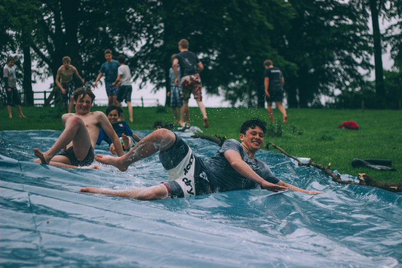 boys with happy faces enjoying slip and slide in wydale hall amp emmaus centre, wydale hall amp emmaus centre 4k