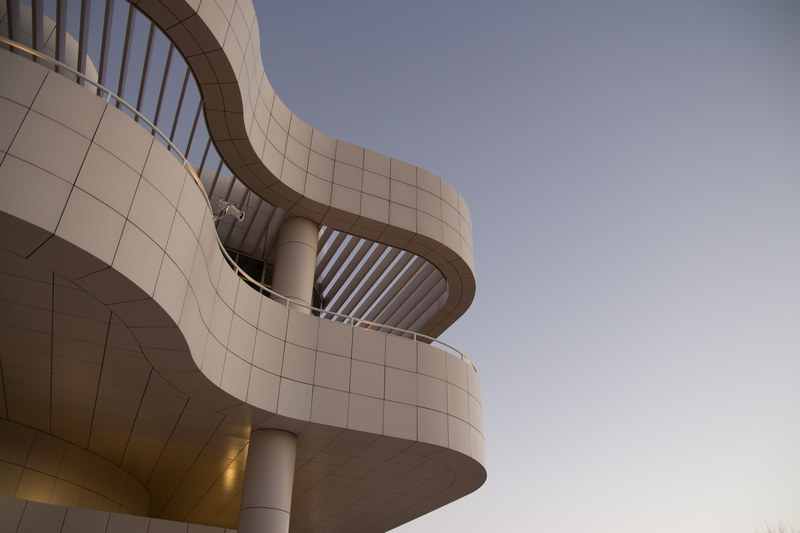 the exterior of white tiled terraces in the top part of a building, tiled terrace exterior 4k
