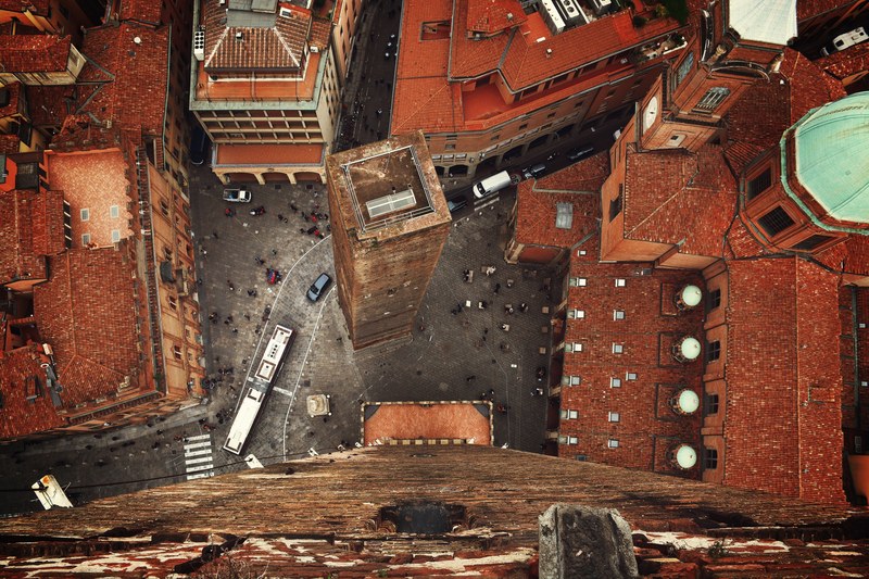 rooftop view of the city of bologna showing people and cars, city of bologna rooftop 4k