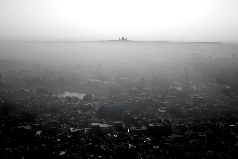 black and white shot of city with haze and taj mahal on the horizon, taj mahal on the horizon 4k