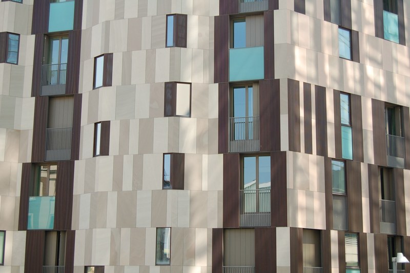 a brown and beige facade of a residential building, elegant beige facade 4k