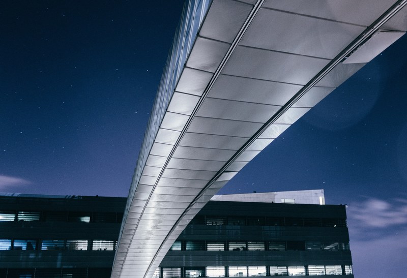 skyway connecting to an office building at night, office bridge 4k