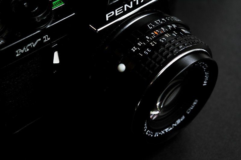 macro of a pentax mv 1 camera and lens, my new 35mm 4k