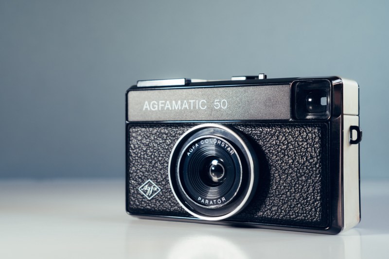 agfa vintage camera on a shiny white surface, agfa vintage camera 4k