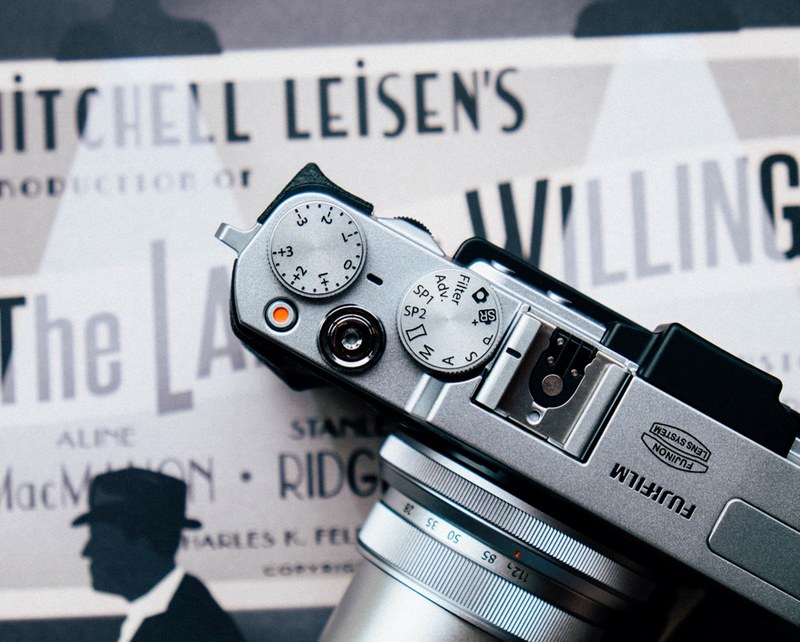 a fujifilm camera on top of a paper in southampton, southampton fujifilm 4k