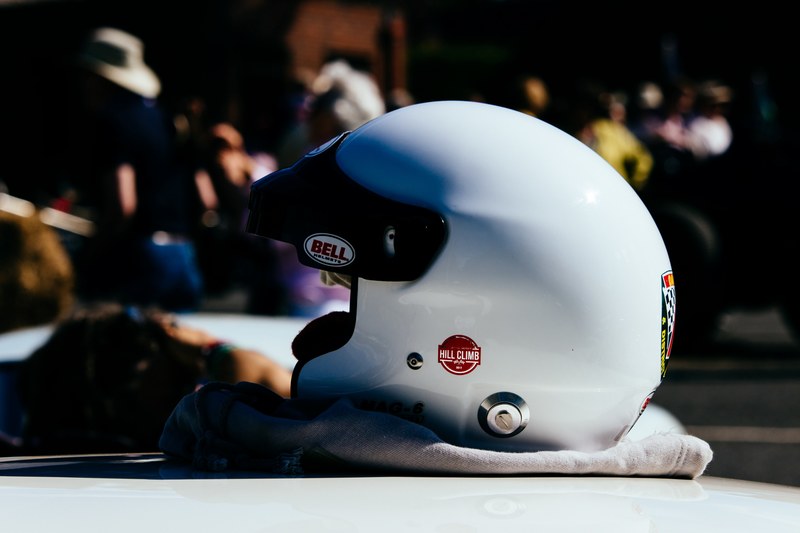 bell white safety helmet sitting on cloth surface, bell white helmet 4k