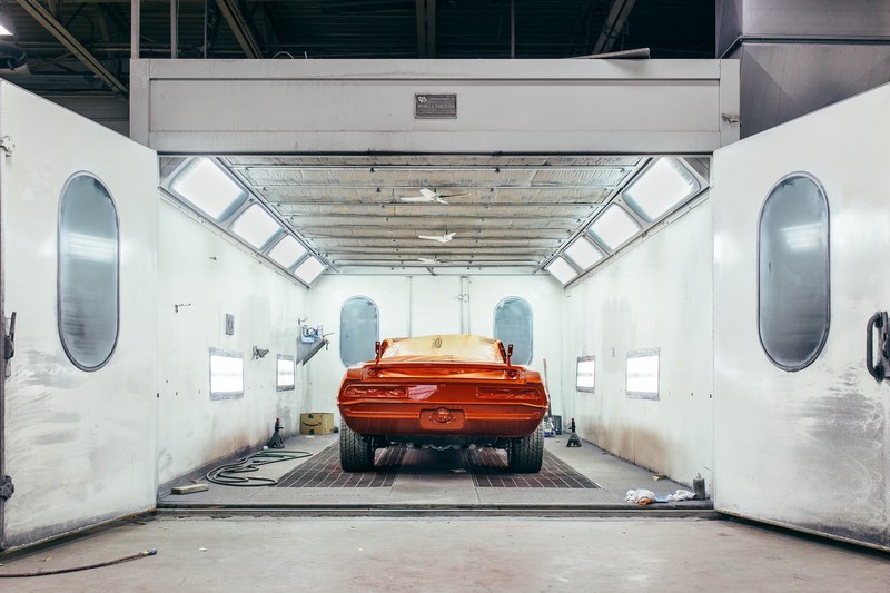 red painted striped restoration project car in the paint booth, rebirth 4k