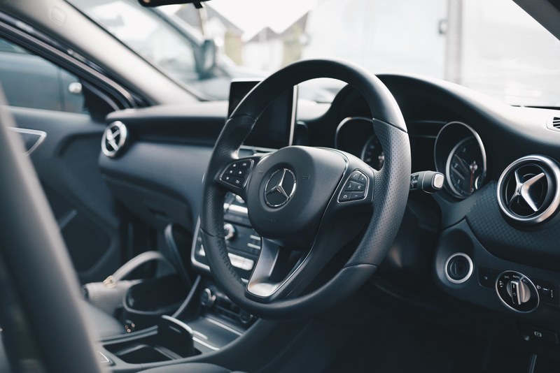 interior of a mercedes benz car centered on the steering wheel, mercedes benz car 4k