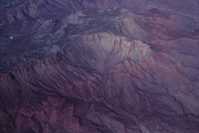 aerial view of valleys and eroded desert valleys, mountain cirque from above 4k