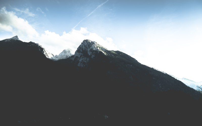 the dark wooded slope of a snow capped mountain in watzmann, the watzmann nbspbeauty of a mountain 4k