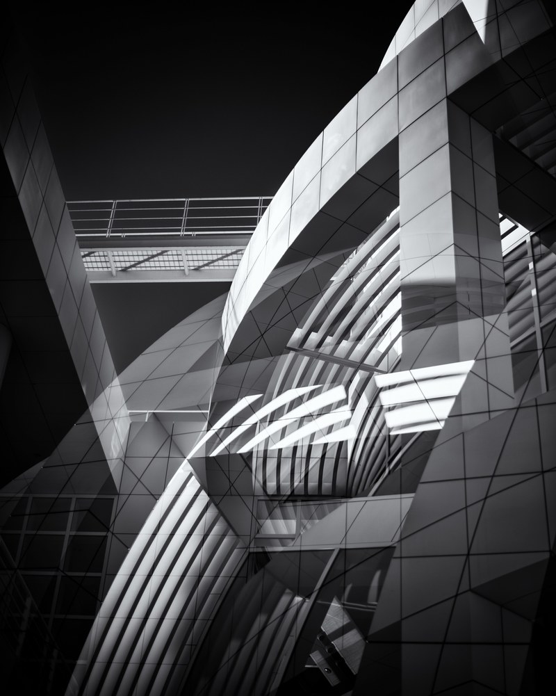an arched gray terrace reflected in a window, getty center architecture 4k