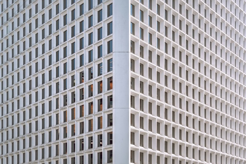 the corner of a white office building in geneva, white office building corner 4k