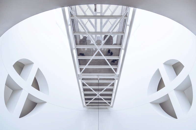interior of san francisco museum of modern art architecture in circular white room with walkway, white walkway 4k