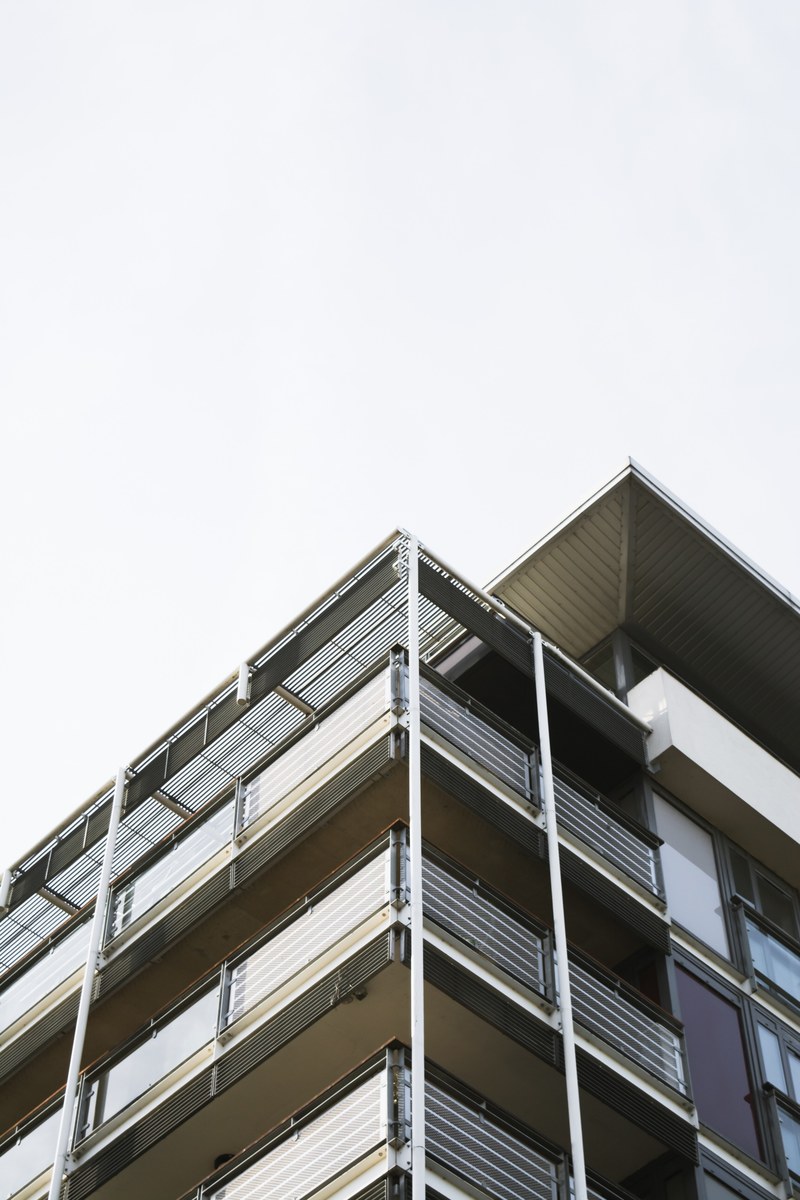 the edge of a modern residential building with large terraces, large terraces 4k