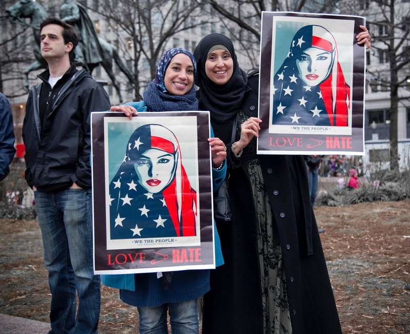 two women wearing hijabs hold love hate signs at the womens march on washington, womens march 2017 two proud ladies 4k