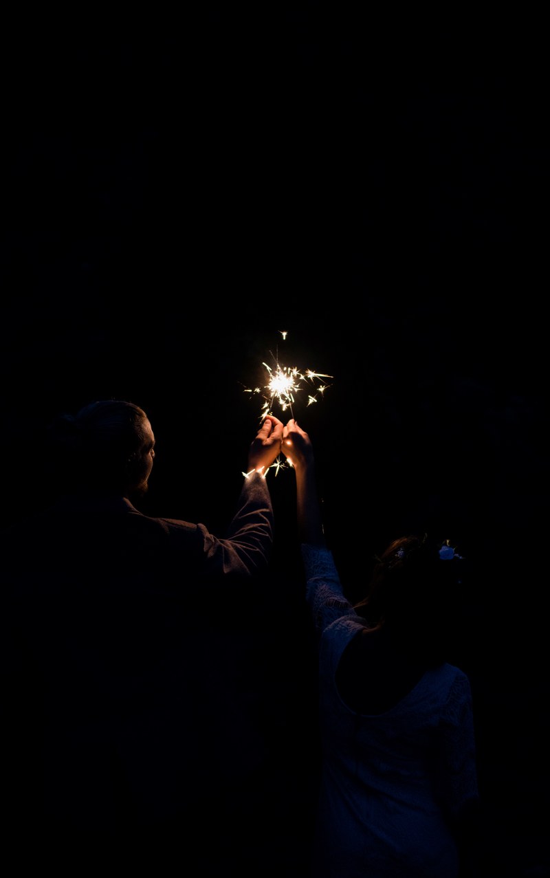 people holding sparklers in the dark, _night sparklers 4k