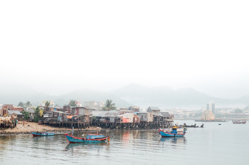 a humble fishing village on a river in natural heritage area trang, vietnamese fishing village 4k