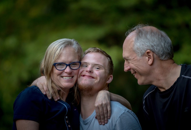 mother son and father in casual shot smiling outdoors, all the family 4k