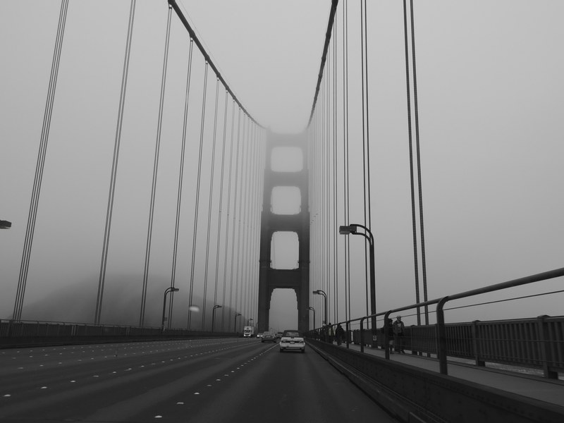 driving the golden gate bridge on a foggy gray day, fog golden gate bridge 4k