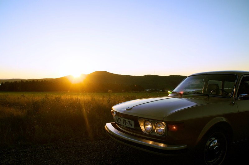 vintage car parked near a field at sunset, retro car at sunset 4k