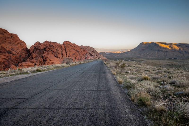 rural road through red rock canyon national conservation area, driving through desert 4k