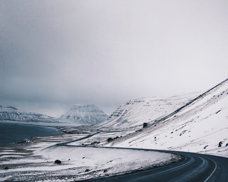 winding winter roads through snowy mountains in iceland, winter roads in iceland 4k