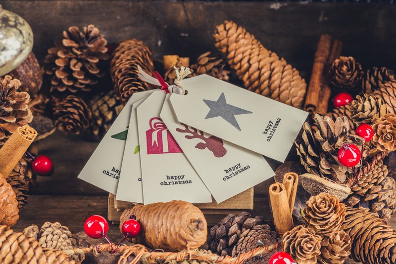 christmas festive label and pine cone 4k