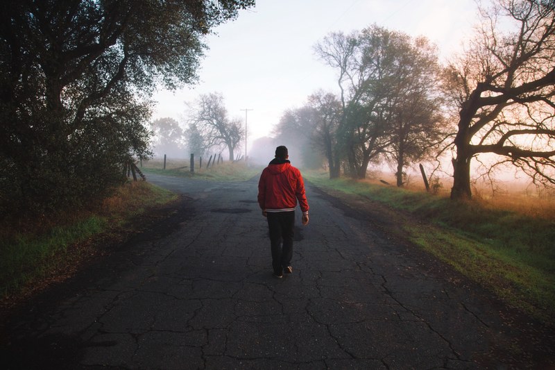 walking alone down a foggy country road, long walks alone 4k