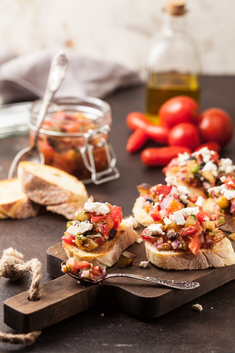 eggplant and tomato bruschetta with goat cheese 4k