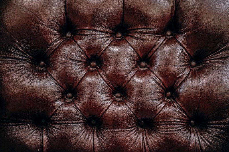 a macro shot of leather cushions at brooks brothers clothing and apparel store, leather background 4k