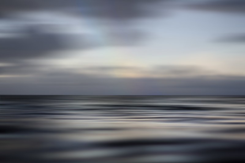 calm ocean sea horizon shot with cloudy sky and reflection in spring haleiwa, calm sea haleiwa 4k