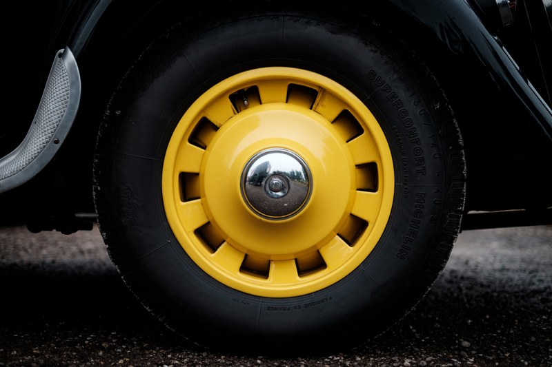 a black tire with a yellow hubcap in colombey les belles, yellow hub cap 4k
