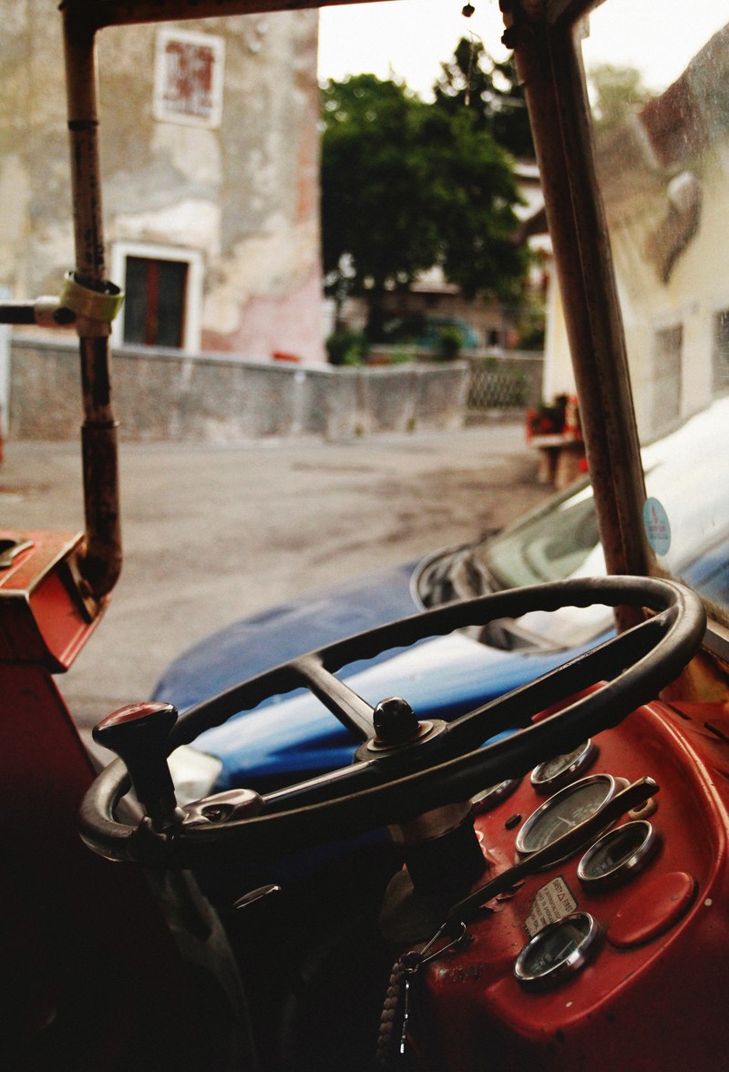 the steering wheel and inside of a tractor in breonio, tractor 4k