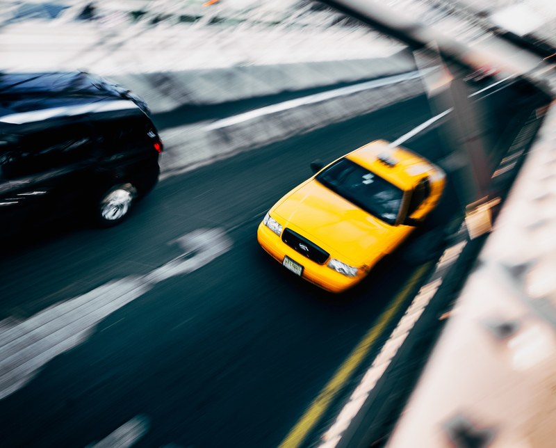 a yellow taxi driving, _yellow car moving 4k
