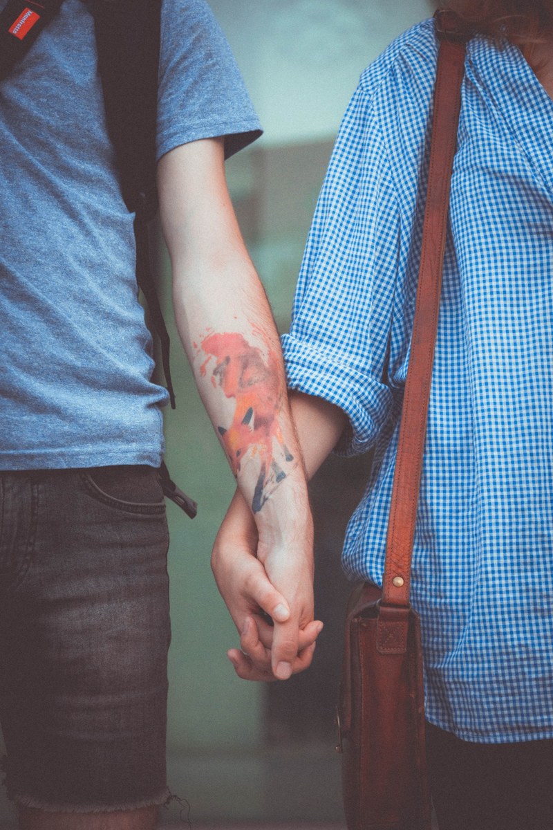 hand holding tattoo and man hd, 4k