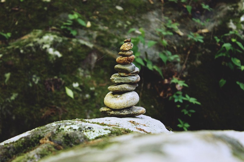 rock stone rock pile and river 4k