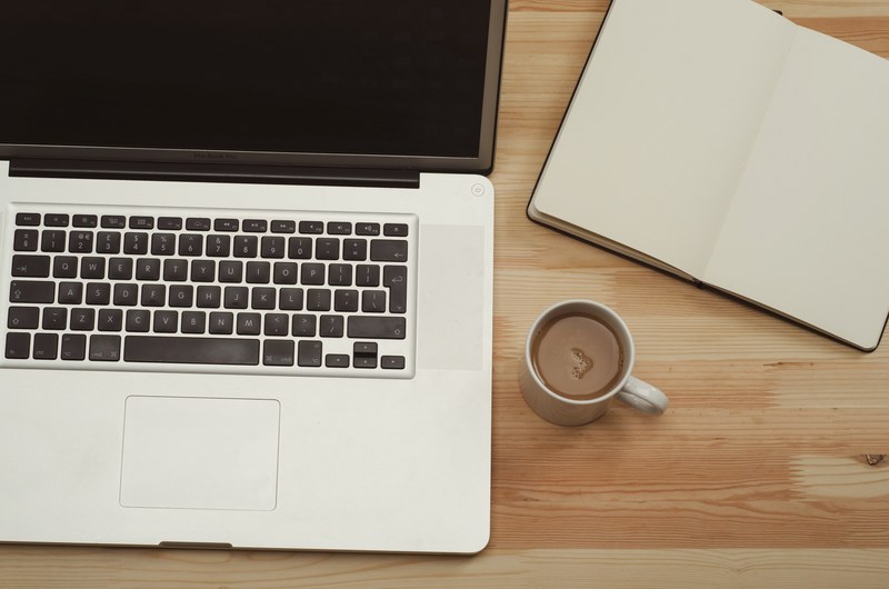 computer wooden desk coffee and notepad 4k
