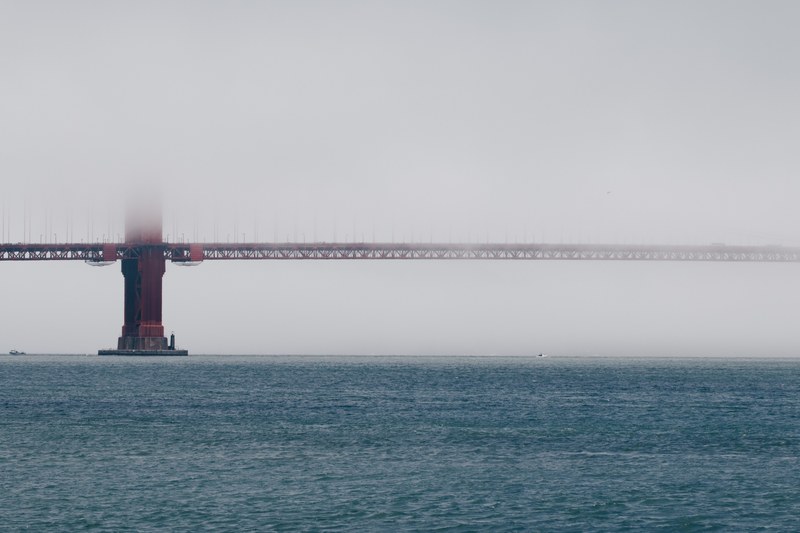 foggy view of golden gate bridge on moody morning by the water, foggy san francisco views 4k