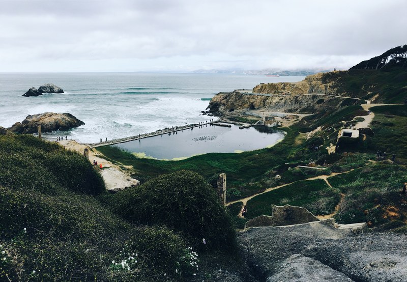 low cliffs around a small closed off ocean inlet, ocean inlet near san francisco 4k