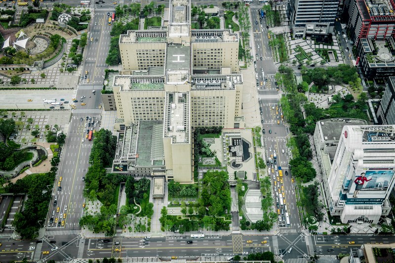drone shot of urban roads and skyscrapers in taipei, skyscrapers and urban road in taipei 4k