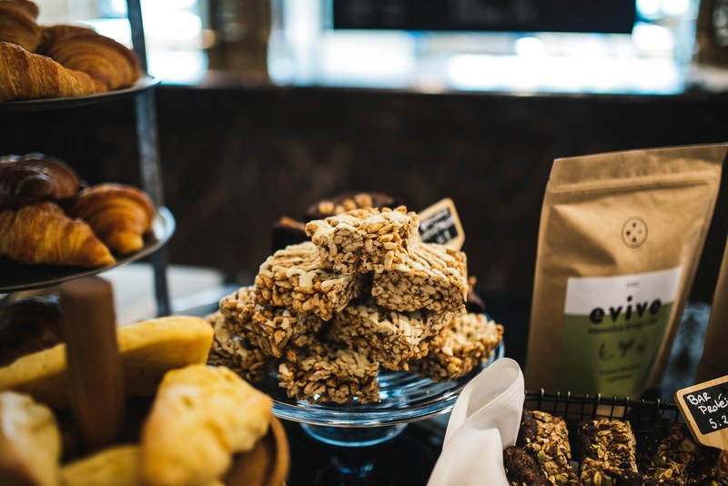 granola cereal bars and pastries at a cafe bakery, cafe bakery treats 4k
