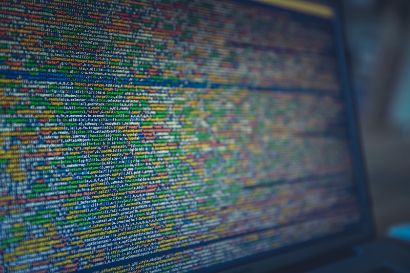 long colorful lines of code on a computer screen, complicated computer code 4k
