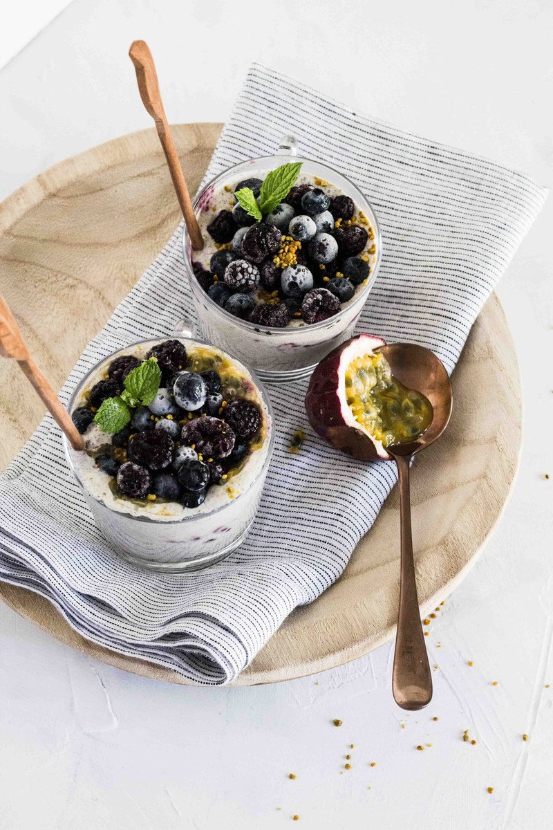 small bowls of food with a spoon, _blueberry chia pudding 4k