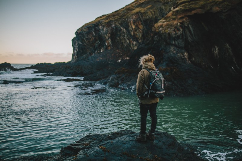 cove rock hiker and looking out 4k