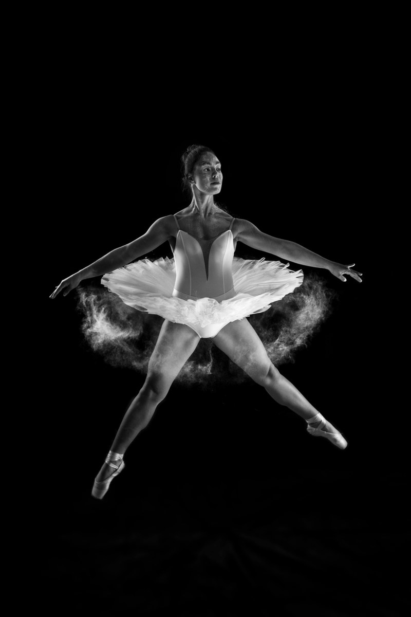 black and white shot of ballet dancer in white tutu jumping in matosinhos, ballet dancer in matosinhos 4k