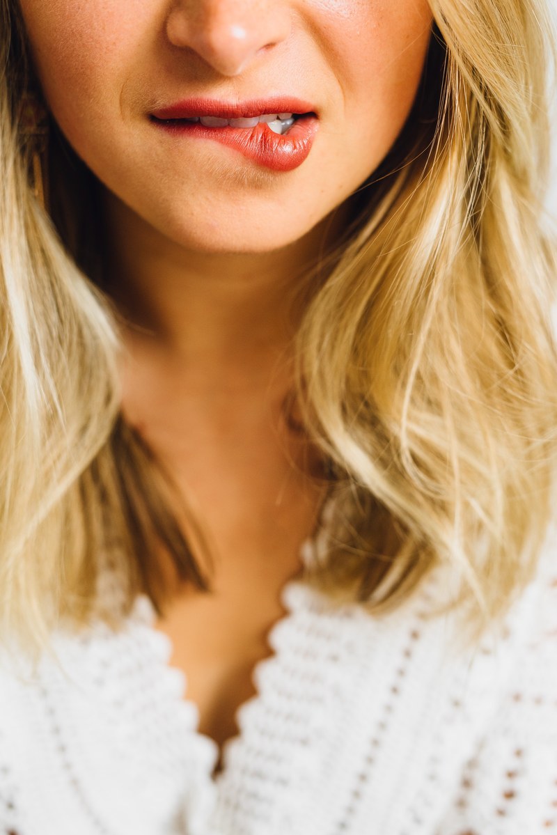 woman bite biting lip and lip hd, 4k