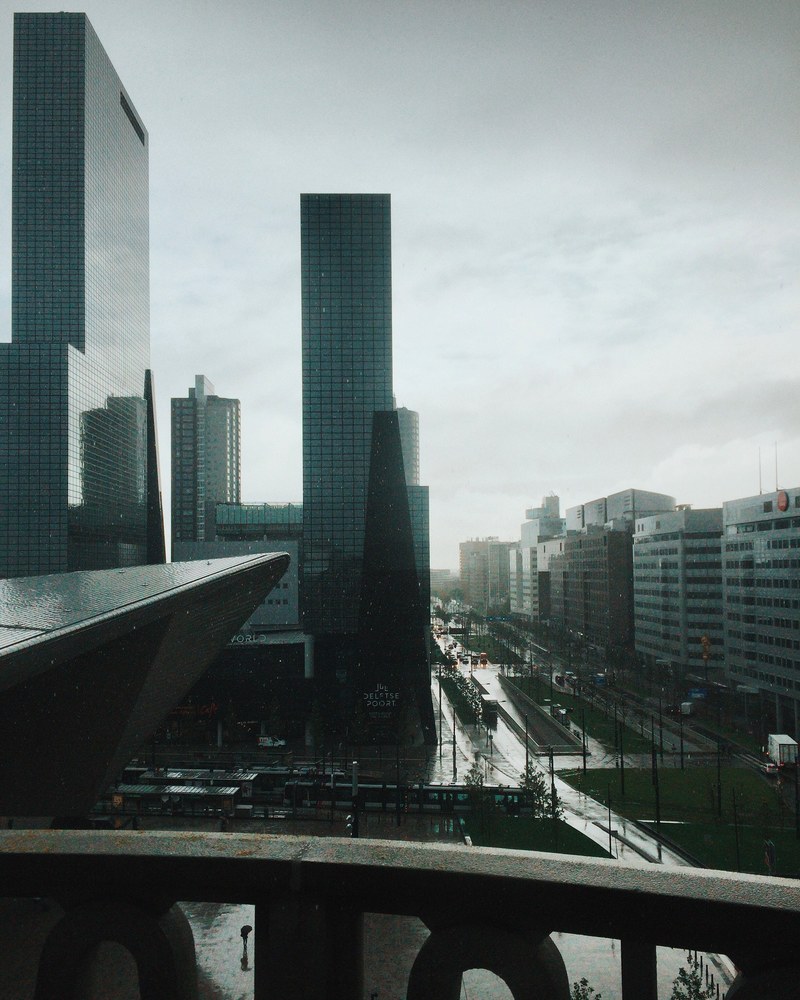 the business district in rotterdam on a rainy day, business district in the rain 4k