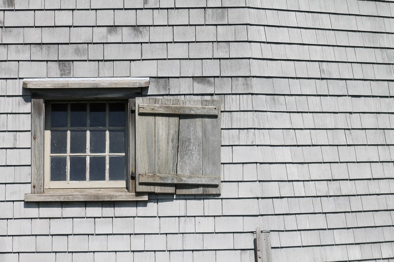 a rustic window with a wooden shutter in a roof, rustic roof window 4k